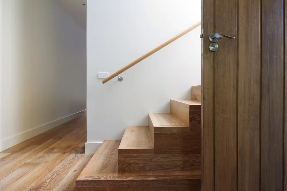 Timber staircase, timber floor and wooden door painting and wood finish work in Sydney.